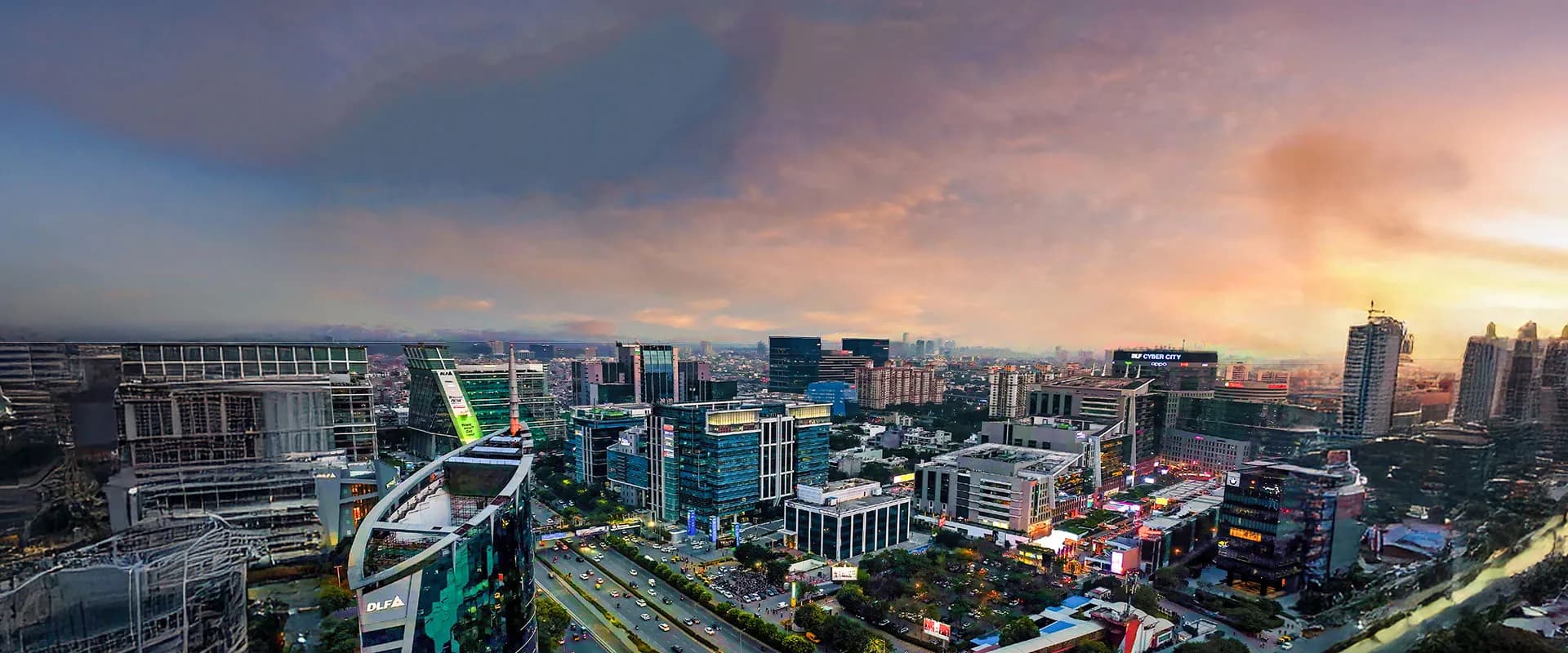 Gurugram Cyber City skyline at dusk